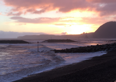 Stunning Sidmouth skies on a winter afternoon - sea, red skies, beach
